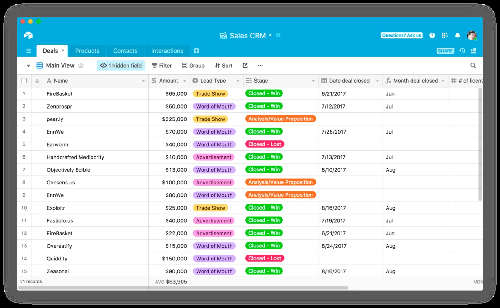 Airtable sales CRM deals grid with amounts, stages and close dates